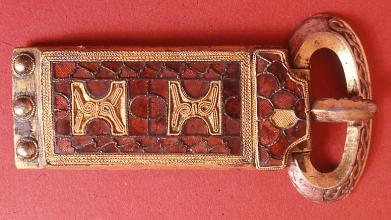 Silver-gilt, gold and garnet cloisonné buckle and buckle plate from the Guilton Grave.